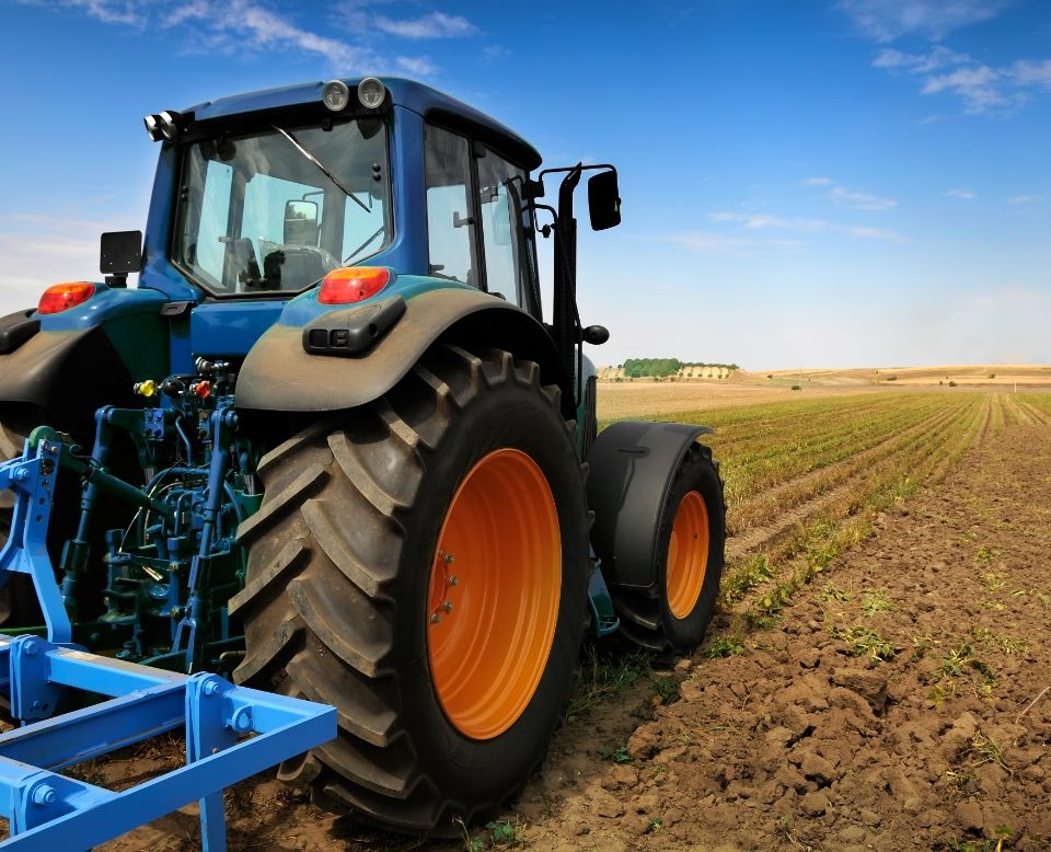 blue tractor equipped with autosteer product from CHCNav